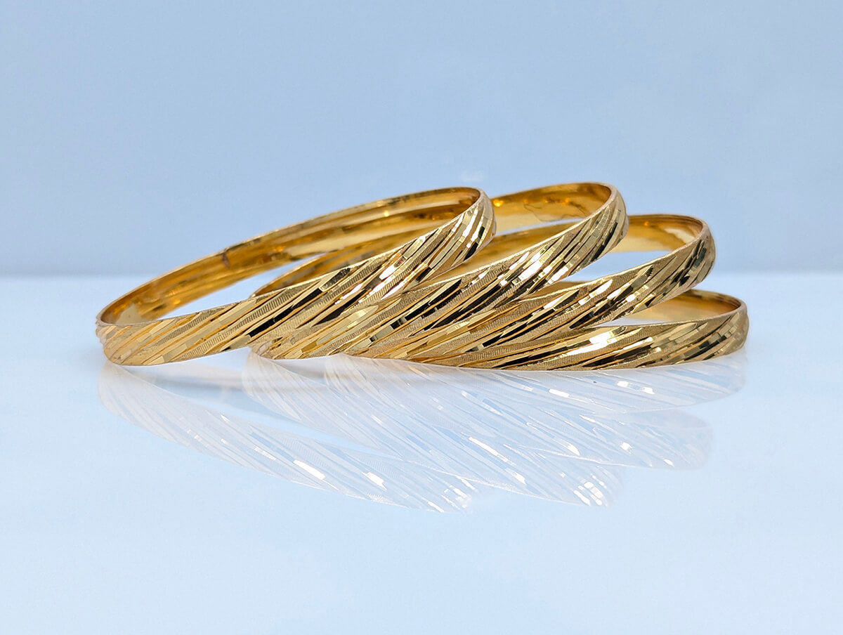 Diagonal Cut Shine Gold Bangle Set – Glam Party & Festive Wear